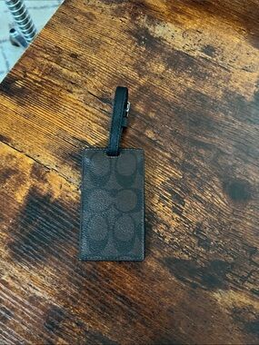 Coach Signature luggage tag